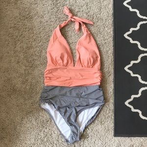 One piece swim suit.